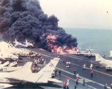 220px-USS_Forrestal_A-4_Skyhawk_burning-1